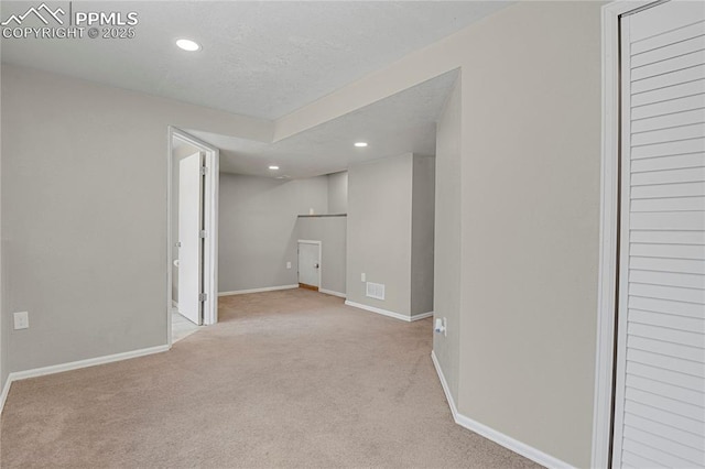 9344 Hirono Rd, Peyton, CO 80831 - below grade area featuring recessed lighting, carpet flooring, and a textured ceiling