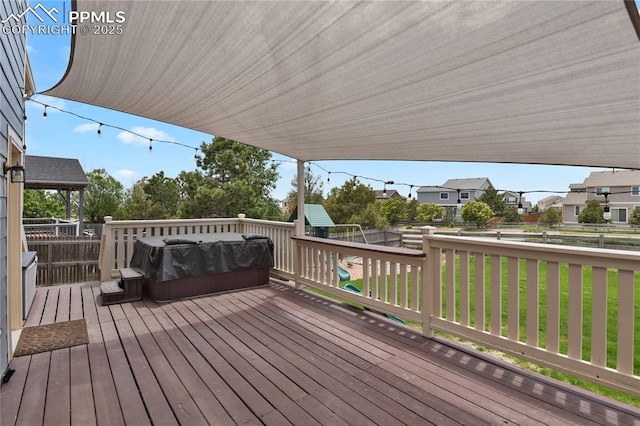 9344 Hirono Rd, Peyton, CO 80831 - wooden deck featuring a playground and a fenced backyard
