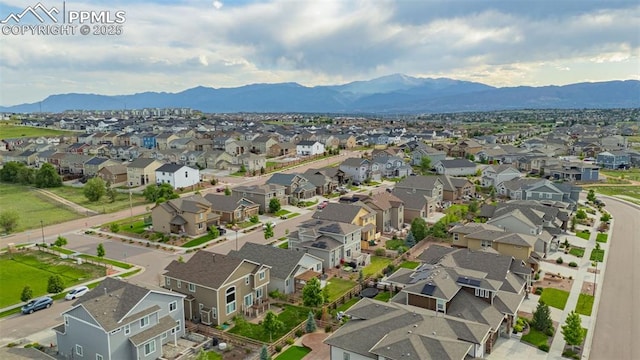 6808 Black Saddle Dr, Colorado Springs, CO 80924 - aerial perspective of suburban area with a mountainous background