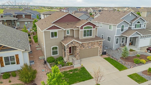 6808 Black Saddle Dr, Colorado Springs, CO 80924 - view of front facade with driveway, a residential view, and a garage
