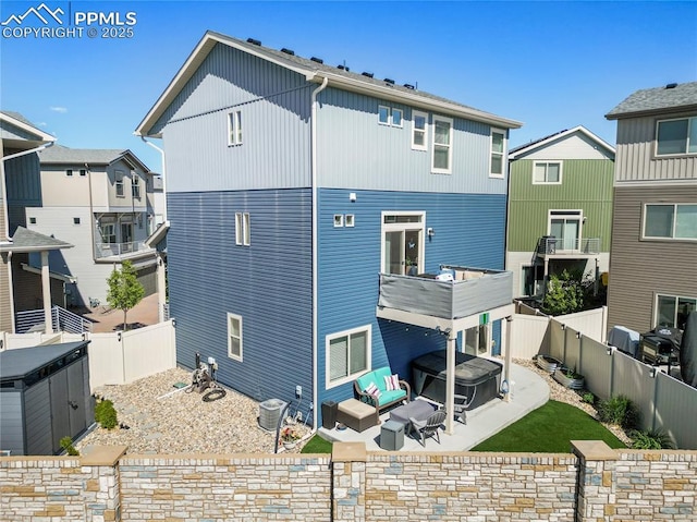 6125 Ashmore Ln, Colorado Springs, CO 80927 - back of house with a fenced backyard and a patio area