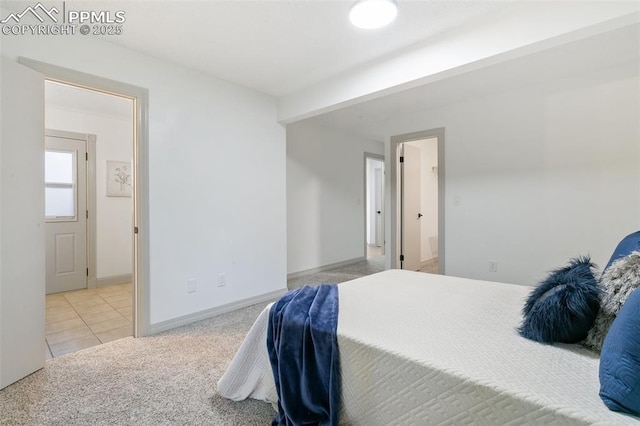 2838 Shadowglen Dr, Colorado Springs, CO 80918 - tiled bedroom with carpet floors
