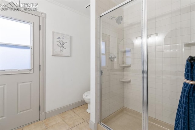 2838 Shadowglen Dr, Colorado Springs, CO 80918 - bathroom featuring a stall shower, ornamental molding, and tile patterned flooring