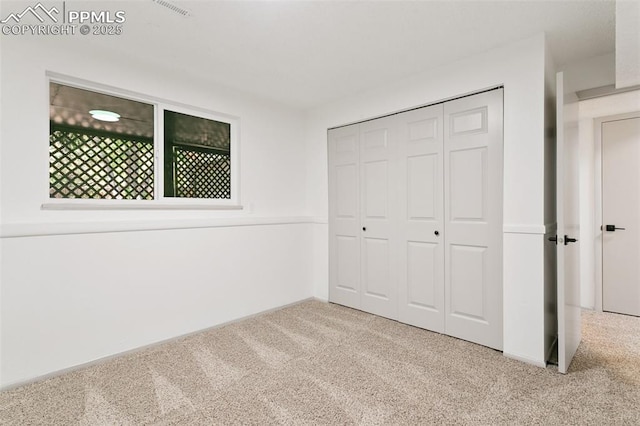 2838 Shadowglen Dr, Colorado Springs, CO 80918 - unfurnished bedroom featuring carpet and a closet