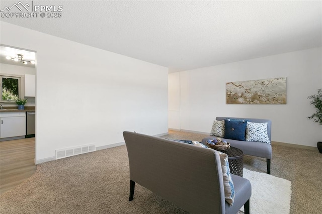 2838 Shadowglen Dr, Colorado Springs, CO 80918 - living area featuring light carpet