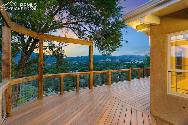 702 Crown Ridge Dr, Colorado Springs, CO 80904 - wooden terrace with a mountain view