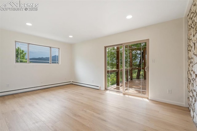 702 Crown Ridge Dr, Colorado Springs, CO 80904 - empty room featuring light wood finished floors and recessed lighting