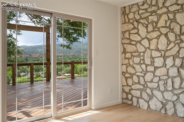 702 Crown Ridge Dr, Colorado Springs, CO 80904 - doorway featuring wood finished floors and plenty of natural light
