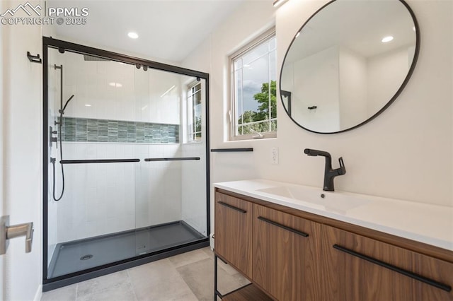 702 Crown Ridge Dr, Colorado Springs, CO 80904 - bathroom featuring vanity, a stall shower, tile patterned flooring, and recessed lighting