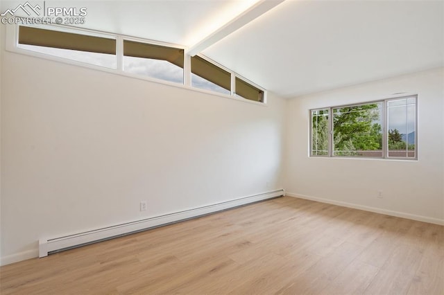 702 Crown Ridge Dr, Colorado Springs, CO 80904 - spare room with baseboard heating and wood finished floors