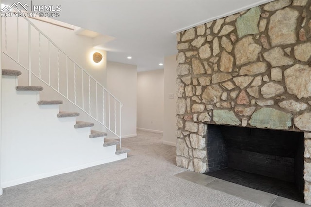 702 Crown Ridge Dr, Colorado Springs, CO 80904 - stairs with carpet flooring and a fireplace