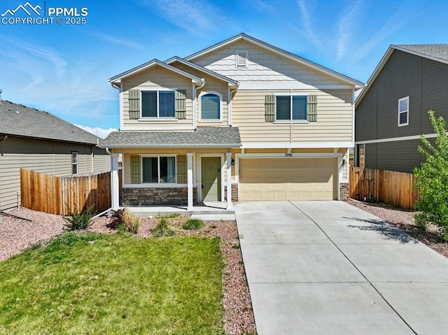 7791 Berwyn Loop, Peyton, CO 80831 - view of front of property featuring stone siding, a garage, concrete driveway, and a porch
