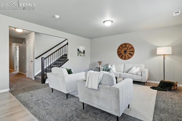 7791 Berwyn Loop, Peyton, CO 80831 - living area featuring stairs and light wood-style floors