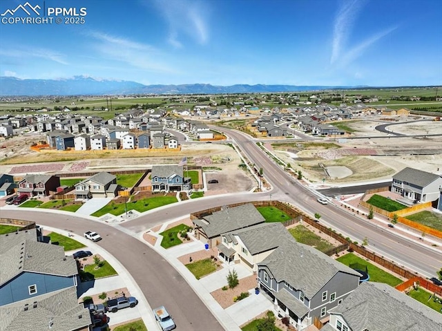 7791 Berwyn Loop, Peyton, CO 80831 - aerial perspective of suburban area featuring a mountainous background
