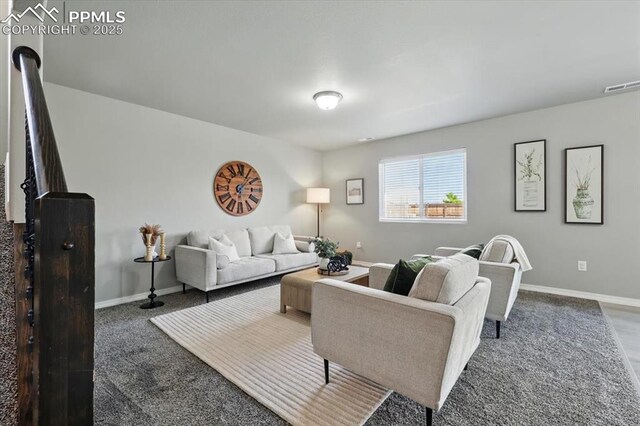 7791 Berwyn Loop, Peyton, CO 80831 - living room with carpet flooring and baseboards