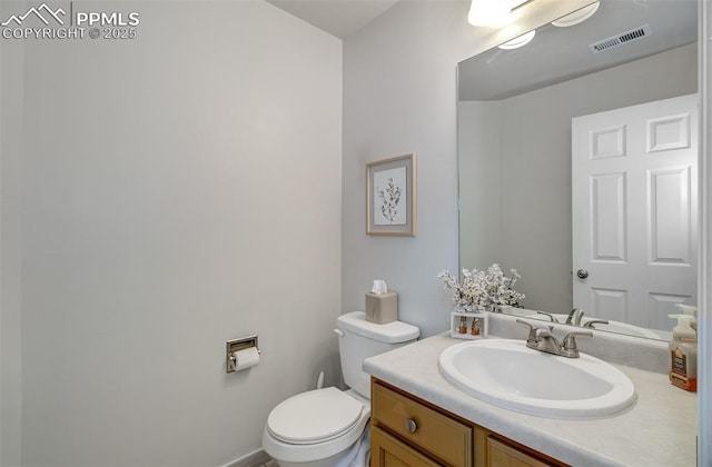 5128 Mountain Air Cir, Colorado Springs, CO 80916 - bathroom with vanity and toilet