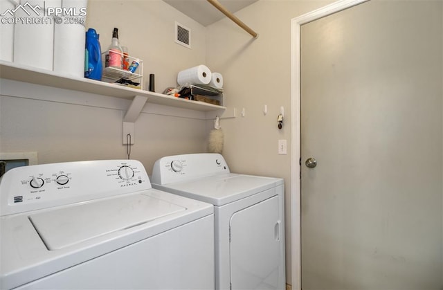 5128 Mountain Air Cir, Colorado Springs, CO 80916 - laundry area featuring washing machine and dryer