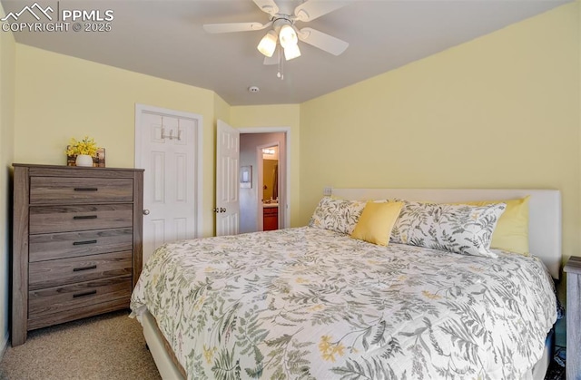 5128 Mountain Air Cir, Colorado Springs, CO 80916 - bedroom with light colored carpet and ceiling fan