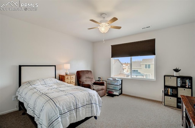 5128 Mountain Air Cir, Colorado Springs, CO 80916 - carpeted bedroom featuring baseboards and a ceiling fan