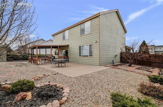 5128 Mountain Air Cir, Colorado Springs, CO 80916 - back of house with a gazebo and a patio area