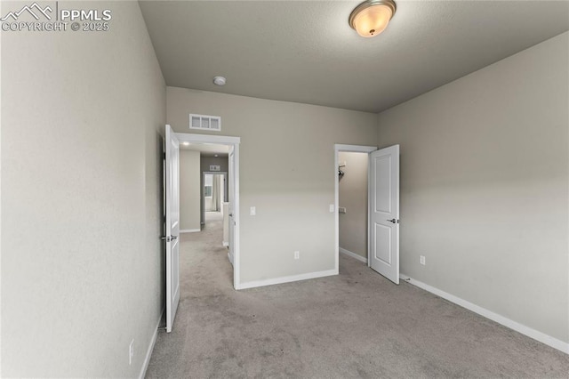 5489 Passport Vw, Colorado Springs, CO 80922 - unfurnished bedroom featuring baseboards and carpet floors