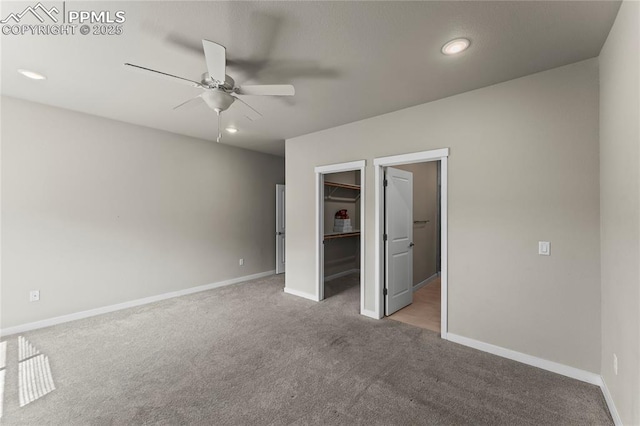 5489 Passport Vw, Colorado Springs, CO 80922 - unfurnished bedroom featuring carpet floors, a walk in closet, recessed lighting, a ceiling fan, and a closet