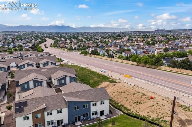 5489 Passport Vw, Colorado Springs, CO 80922 - aerial perspective of suburban area with a mountain backdrop