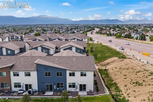 5489 Passport Vw, Colorado Springs, CO 80922 - aerial perspective of suburban area with a mountainous background