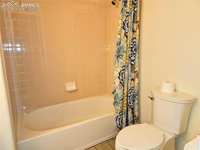 2114 Summerset Dr, Colorado Springs, CO 80920 - bathroom featuring toilet and shower / bathtub combination with curtain