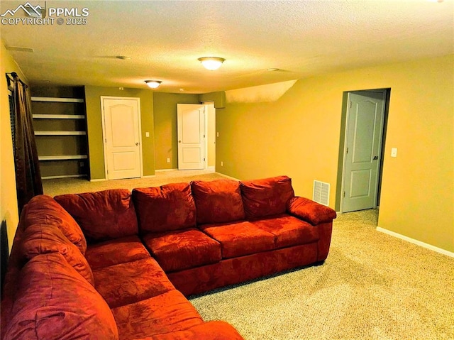 2114 Summerset Dr, Colorado Springs, CO 80920 - carpeted living area featuring a textured ceiling and baseboards