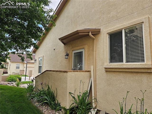 2114 Summerset Dr, Colorado Springs, CO 80920 - view of side of property featuring stucco siding
