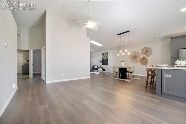 5115 Vista Del Norte Pt, Colorado Springs, CO 80919 - living room featuring ceiling fan, wood finished floors, and high vaulted ceiling