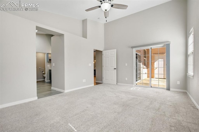 5115 Vista Del Norte Pt, Colorado Springs, CO 80919 - unfurnished bedroom featuring carpet, a towering ceiling, and ceiling fan