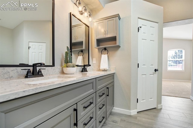5115 Vista Del Norte Pt, Colorado Springs, CO 80919 - full bath with double vanity and wood finished floors