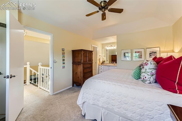 2512 Elite Ter, Colorado Springs, CO 80920 - bedroom featuring carpet flooring, ensuite bathroom, a chandelier, and a ceiling fan