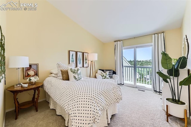 2512 Elite Ter, Colorado Springs, CO 80920 - carpeted bedroom featuring access to exterior and vaulted ceiling