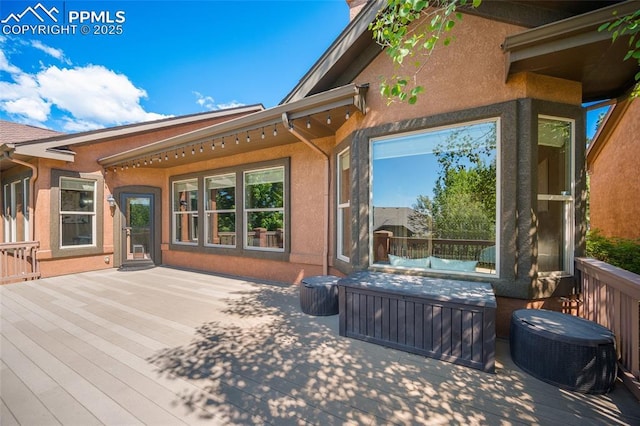 1117 Spectrum Loop, Colorado Springs, CO 80921 - wooden terrace featuring a patio area