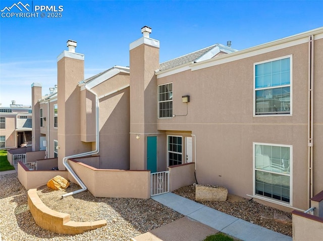 3210 Van Teylingen Dr Unit E, Colorado Springs, CO 80917 - view of home's community with a gate