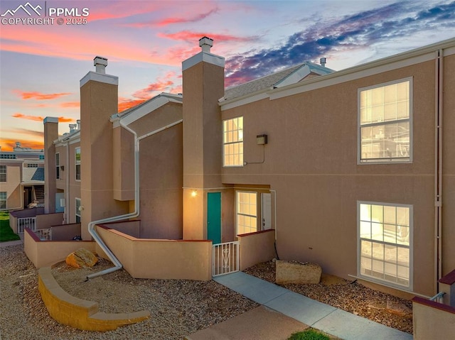 3210 Van Teylingen Dr Unit E, Colorado Springs, CO 80917 - view of property at dusk