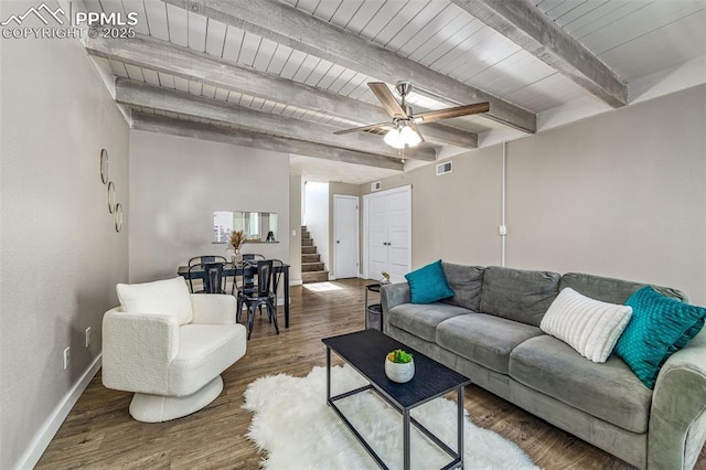 3210 Van Teylingen Dr Unit E, Colorado Springs, CO 80917 - living area featuring stairway, a ceiling fan, wood finished floors, and a wood ceiling with exposed beams