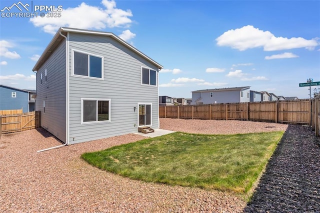 6211 Godwit Ln, Colorado Springs, CO 80925 - back of house featuring a fenced backyard