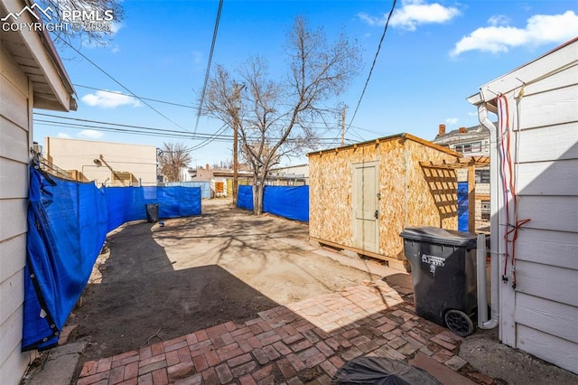 609 W 8th St Unit 611, Pueblo, CO 81003 - view of patio with a storage shed