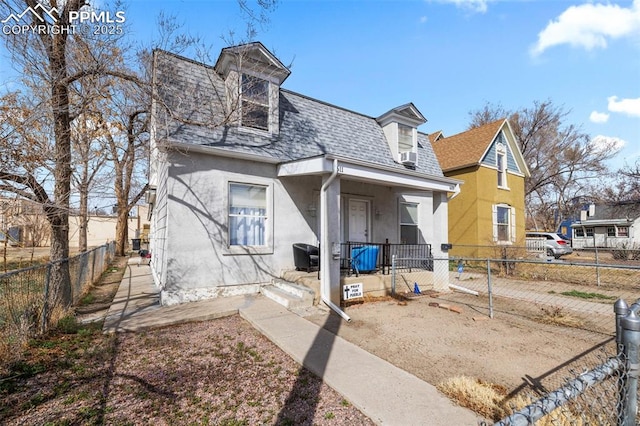 609 W 8th St Unit 611, Pueblo, CO 81003 - back of property featuring a shingled roof and stucco siding