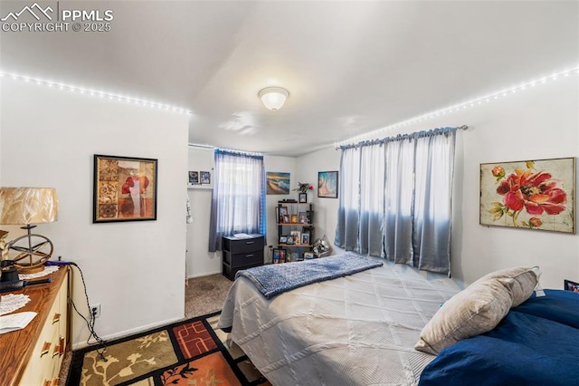 609 W 8th St Unit 611, Pueblo, CO 81003 - carpeted bedroom featuring baseboards