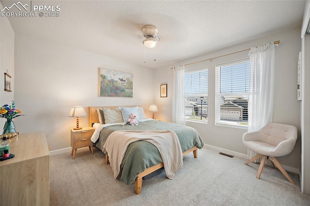 8082 Goldenray Pl, Colorado Springs, CO 80908 - bedroom with light carpet and ceiling fan