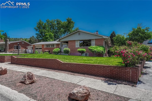 2533 Bennett Ave, Colorado Springs, CO 80909 - ranch-style home featuring a front lawn, brick siding, and a chimney