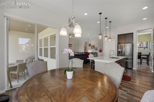 10076 Oro Belle Ct, Colorado Springs, CO 80924 - dining area with dark wood-style floors and recessed lighting