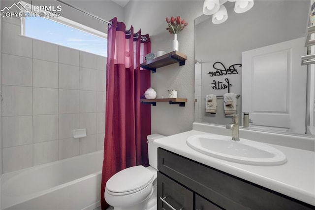 10076 Oro Belle Ct, Colorado Springs, CO 80924 - full bathroom featuring shower / bath combo, vanity, and a textured wall