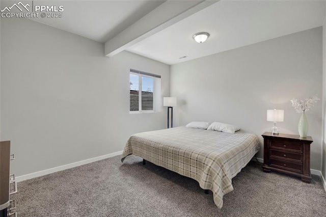 10076 Oro Belle Ct, Colorado Springs, CO 80924 - carpeted bedroom featuring beamed ceiling and baseboards