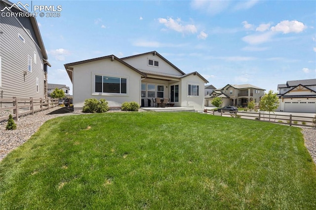10076 Oro Belle Ct, Colorado Springs, CO 80924 - rear view of property with stucco siding and a patio area